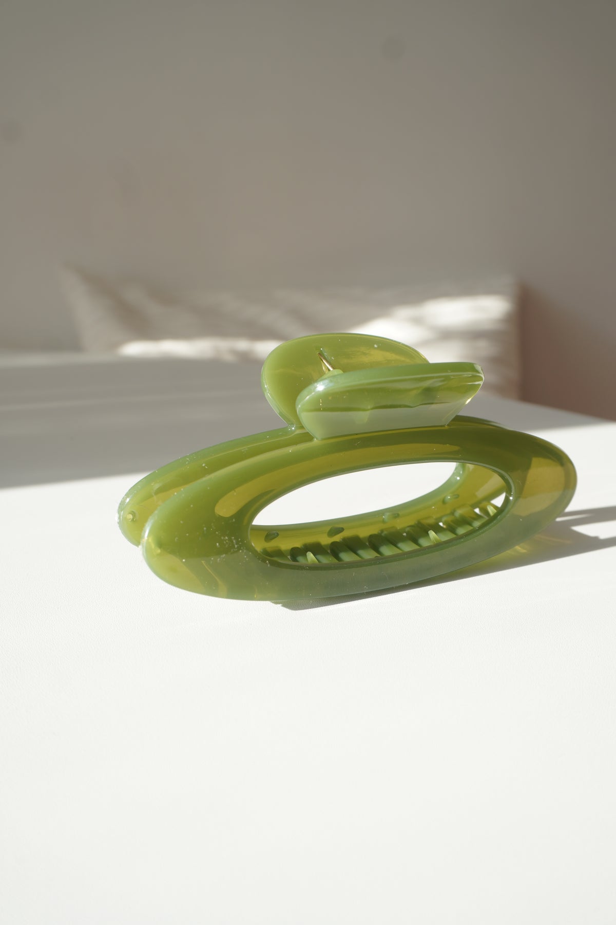 Pince à cheveux verte