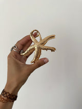 Pince à cheveux étoile de mer dorée