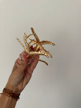 Pince à cheveux étoile de mer dorée