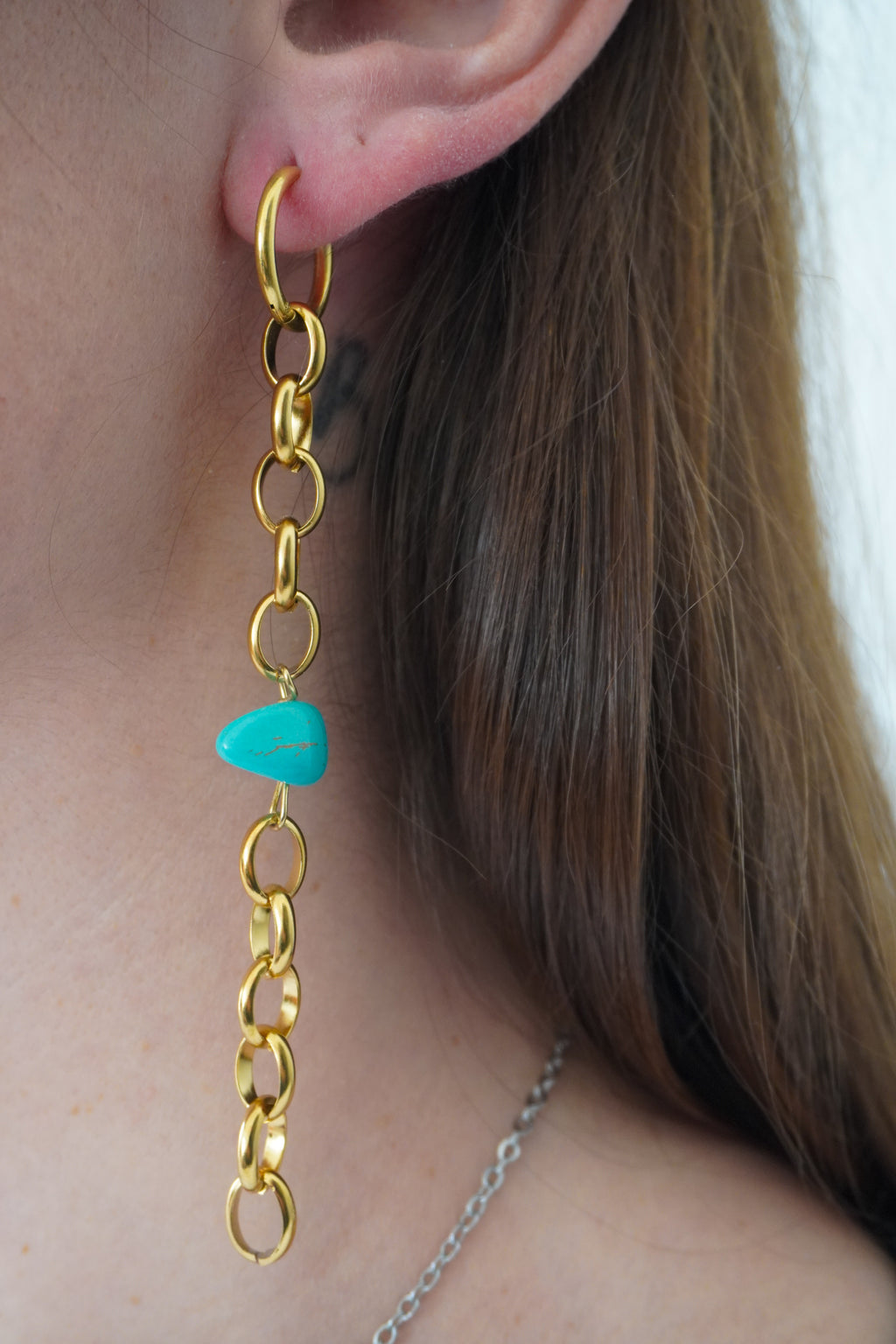 Boucle d'oreille NYX