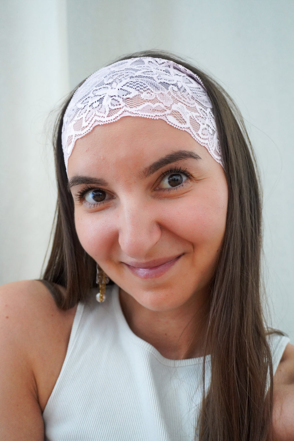 Bandeau en dentelle rose claire