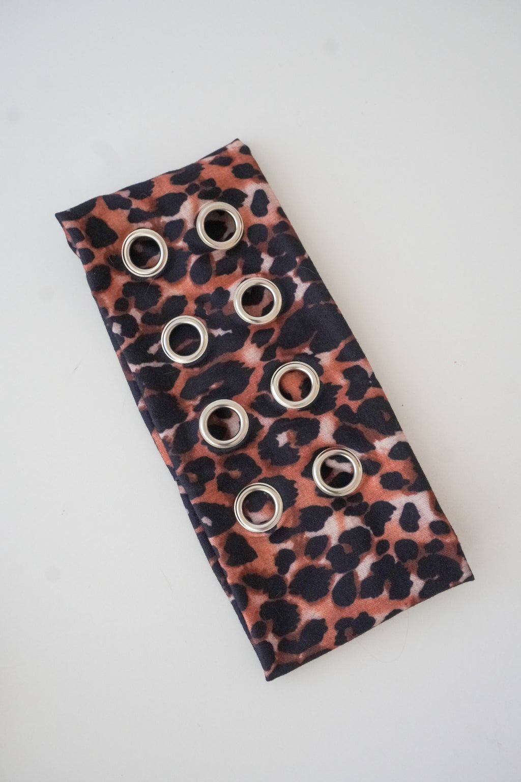Bandeau oeillets léopard